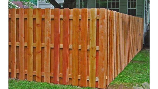 Battle of the Fences: Chain Link vs. Wood